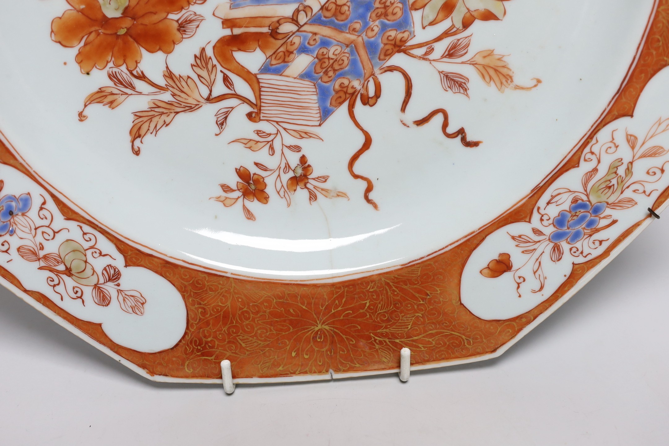 A pair of Chinese rouge de fer and blue enamelled octagonal dishes, early Qianlong period, c.1740, 32.5cm